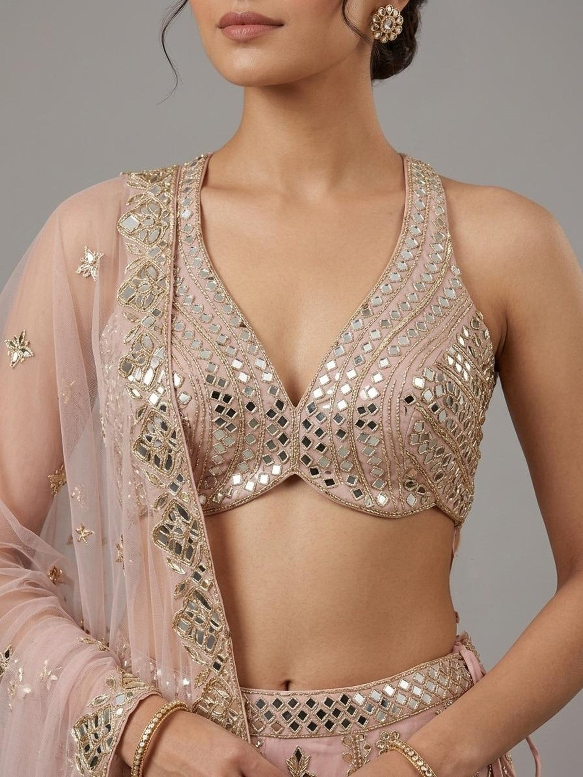Peach Net Heritage Lehenga Choli